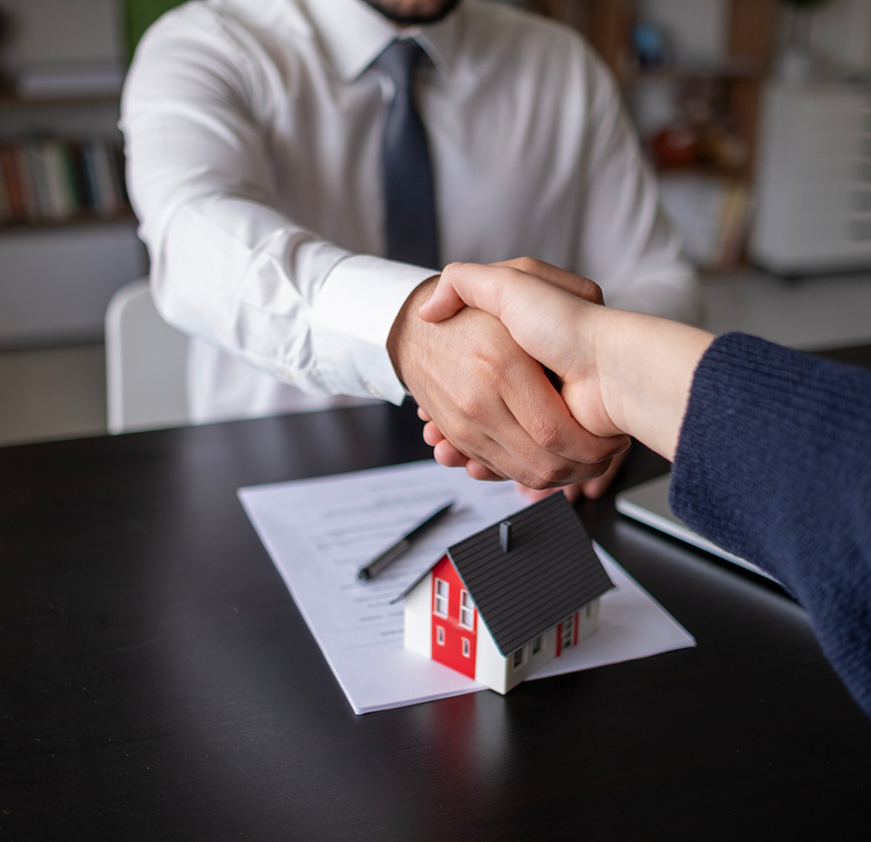 Real estate agreement handshake