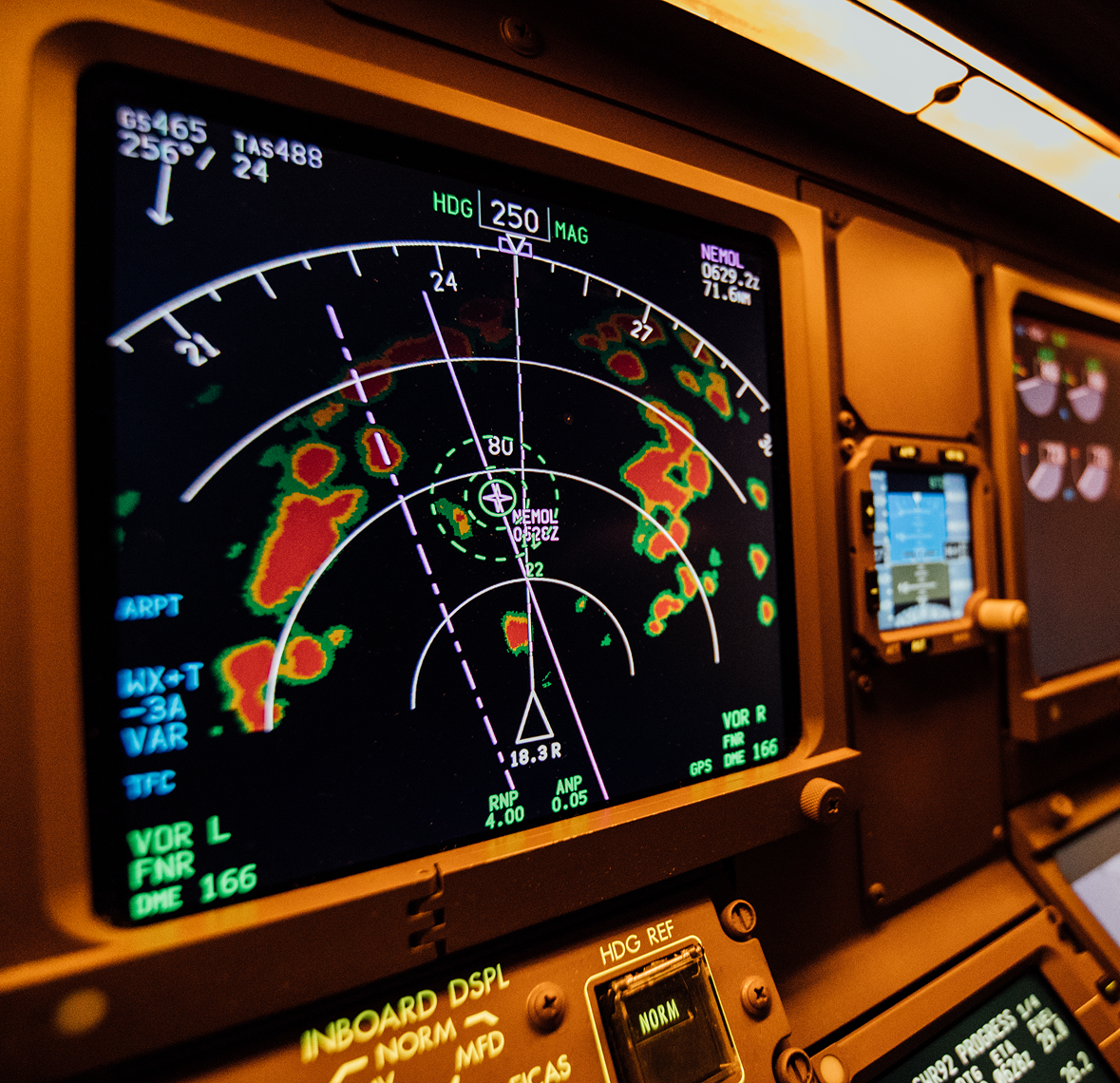 Aircraft cockpit weather radar showing storm cells
