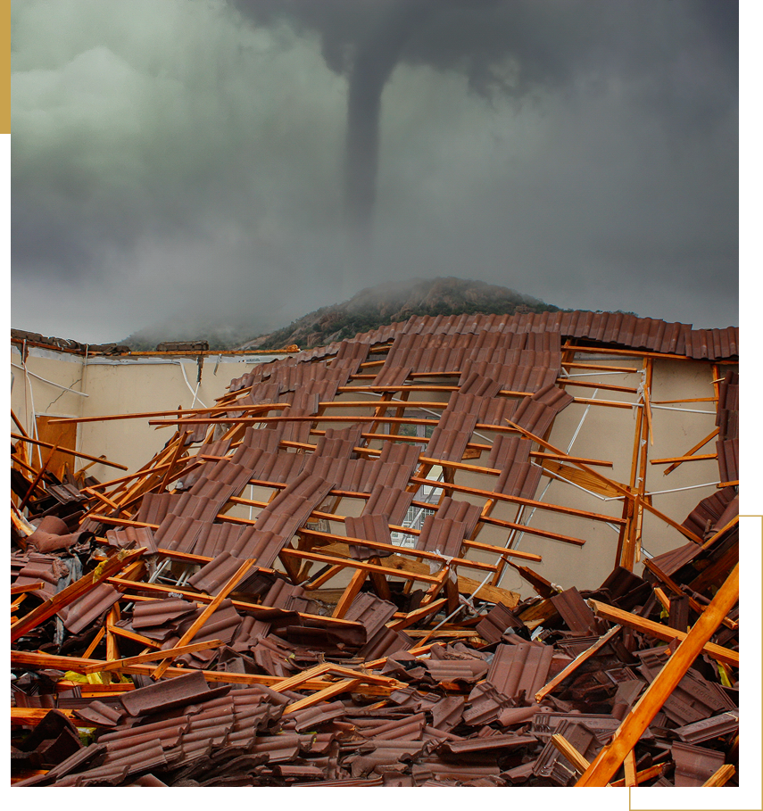 Tornado over collapsed building with roof debris